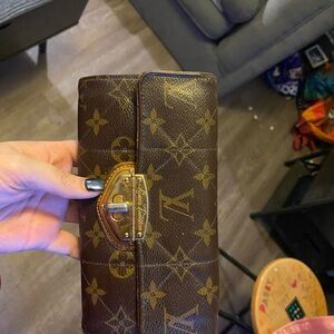 LV wallet with metal snap